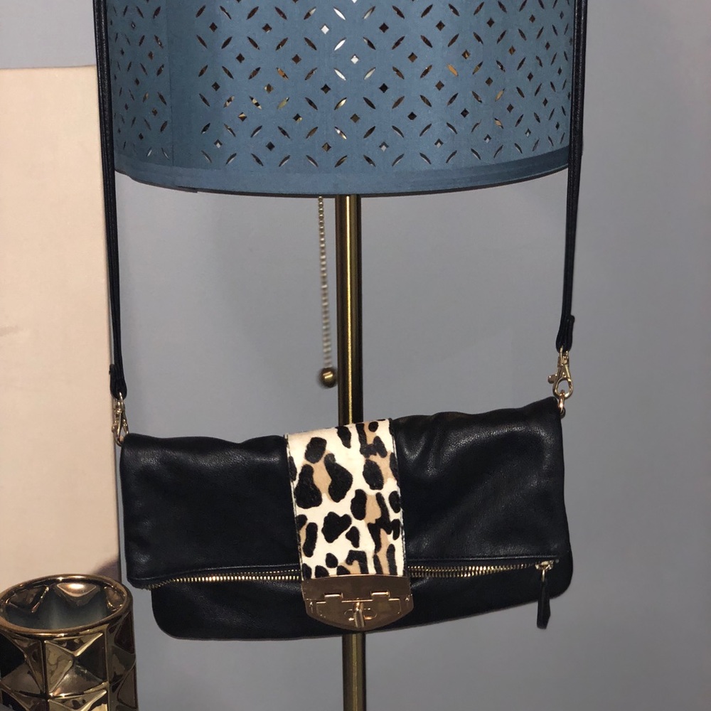 Aldo clutch, signs of use but in great condition.